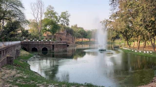 Serene View of Hauz Khas Lake With Fountain in Delhi