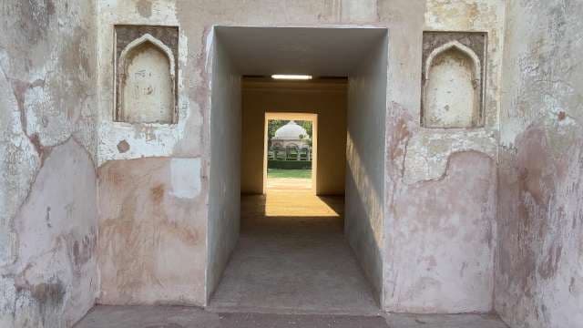 Ancient Mughal Tomb Corridor With Architectural Details