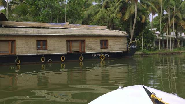 Traditional Houseboat Cruising Kerala’s Scenic Backwaters