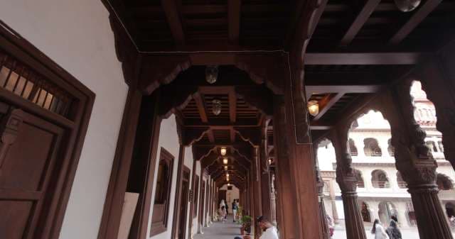 Traditional Wooden Corridor at Indian Palace Complex
