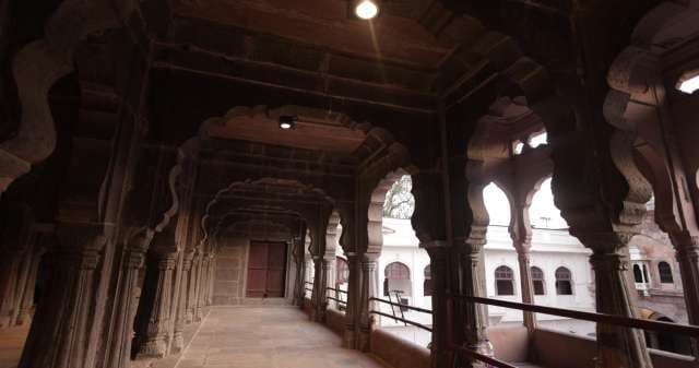 Majestic Corridor of Indian Palace with Stone Arches