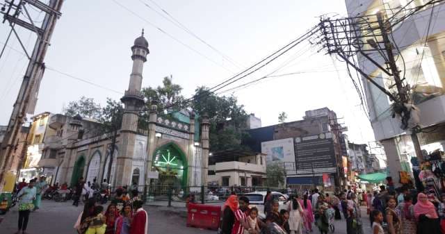 Busy Street Life Outside Historic Mosque in India
