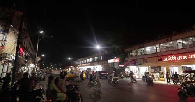Bustling Night Market Street in Indore with Shoppers and Vendors