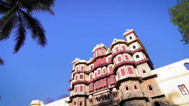 Majestic Rajwada Palace Under Clear Blue Skies in Indore