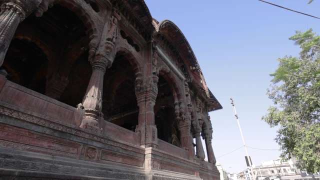 Historic Haveli Facade in Indore, India Under Clear Blue Sky