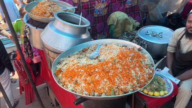 Delicious Indian Street Biryani Served Fresh at Red Fort Local Market