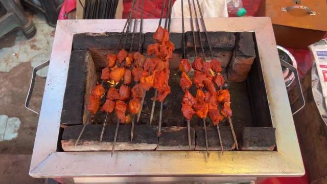 Street Food Tandoori Chicken Skewers Grilled Over Open Flame