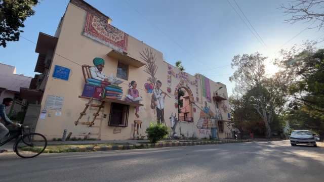 Vibrant Indian Street Mural Celebrates Local Culture and Life