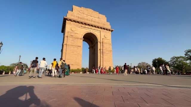 Tourists Visit India Gate: Iconic War Memorial in Delhi