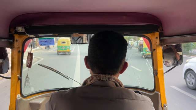 Auto Rickshaw Ride Through Busy Delhi Streets