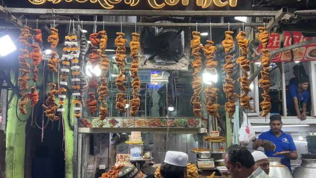 Street Food Stall with Grilled Chicken Skewers in Mumbai