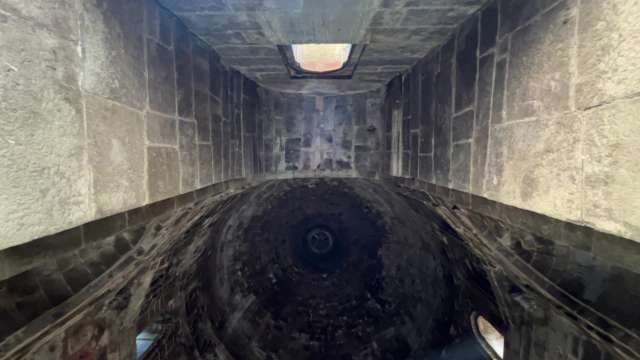 Inside a Historic Stone Dome With Skylight