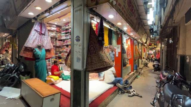 Traditional Indian Clothing Market in Bustling Delhi Alley