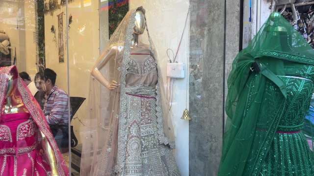 Stunning Bridal Lehengas Displayed in Indian Boutique Window