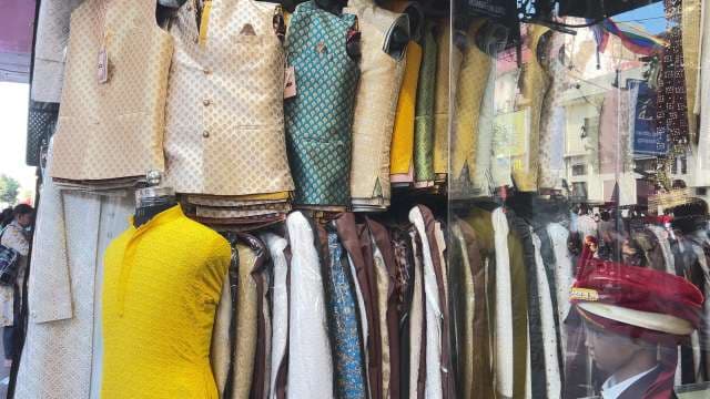 Traditional Indian Ethnic Wear Displayed in Market Storefront