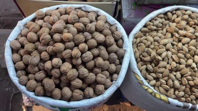 Fresh Walnuts and Almonds at Local Market Stall