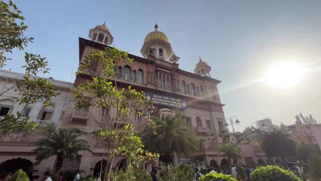 Historic Gurudwara Sis Ganj Sahib in Old Delhi Under Sunlight