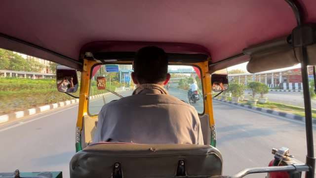 Auto Rickshaw Ride Through Indian City Streets