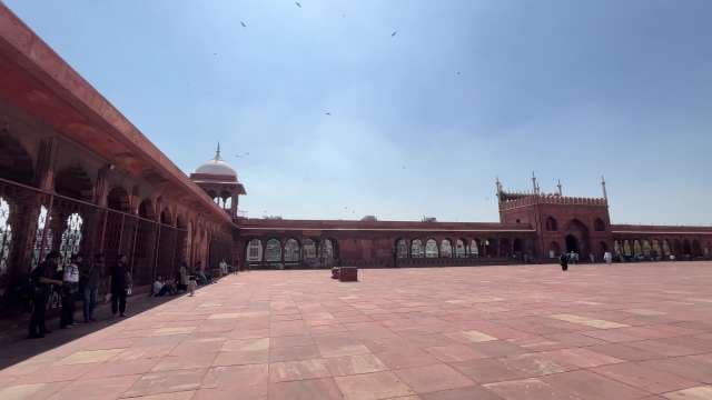 Jama Masjid Courtyard Under Clear Blue Skies in Delhi