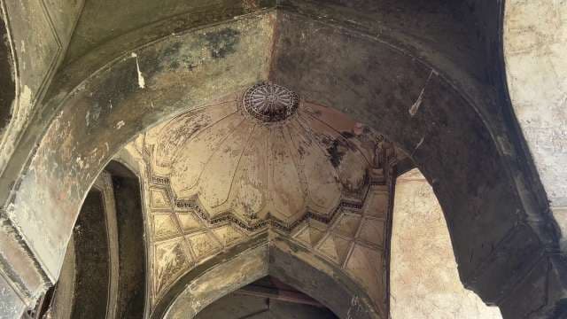 Intricate Mughal Dome Ceiling With Geometric Patterns