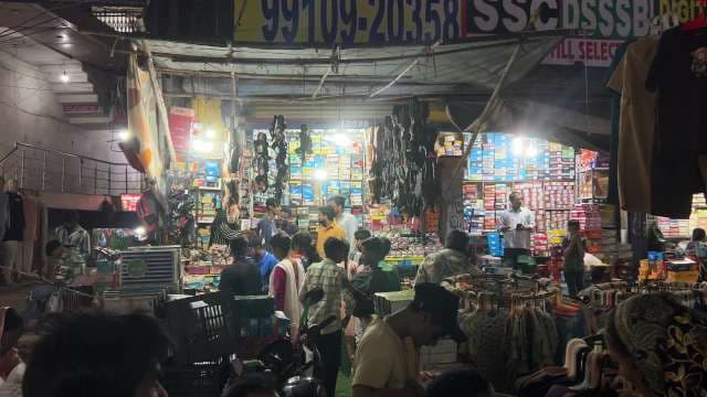 Bustling Night Market Shopping in Delhi's Urban Streets