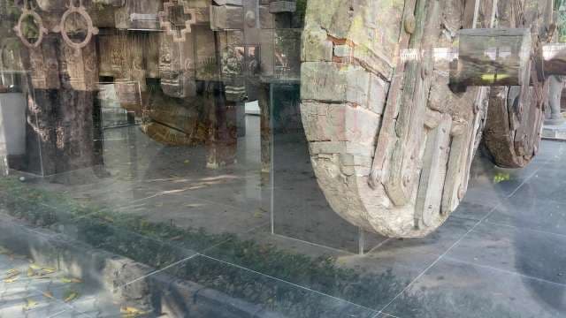 Ancient Wooden Temple Chariot Displayed in Museum Exhibit