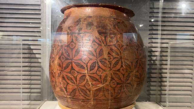 Ancient Painted Pottery Jar With Geometric Floral Patterns