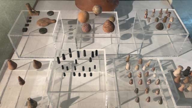 Ancient Board Game Pieces and Dice from Early Civilizations