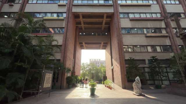 Indian Habitat Center Entryway with Sculptures and Students