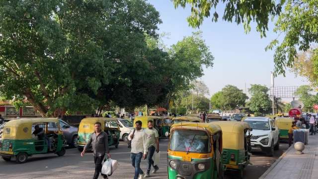 Busy Auto Rickshaw Stand in Central Delhi City Traffic