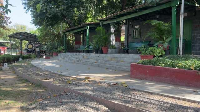 Miniature Train Station With Classic Steam Engine