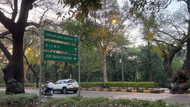 Safdarjung Airport Road Sign in New Delhi Traffic Scene