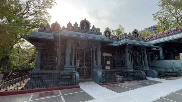 Majestic Hindu Temple Exterior Under Sunlit Sky