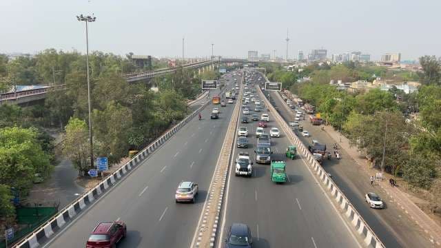 Busy Traffic Flow on Delhi Main Highway in Daylight