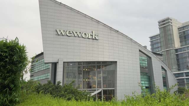 Modern WeWork Office Building Exterior in Cityscape