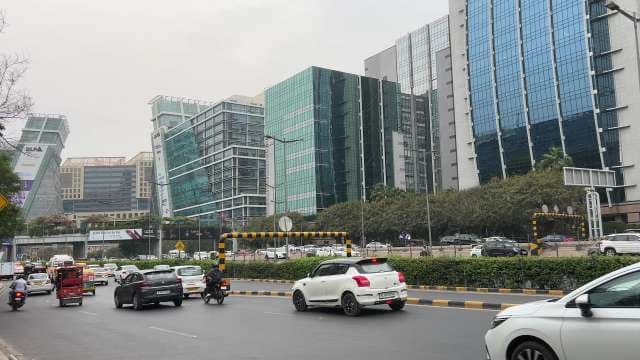 Modern Gurgaon Traffic and Business District Scene