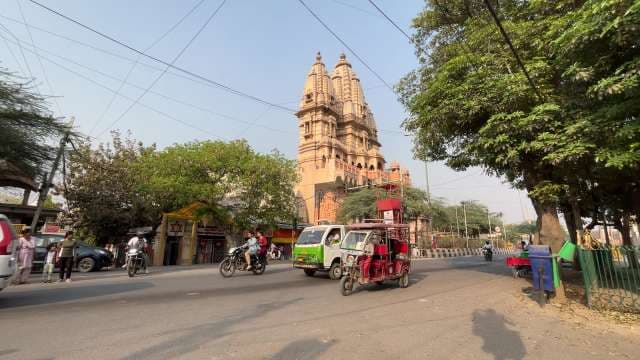 Bustling Street Scene Outside Historic Hindu Temple in India