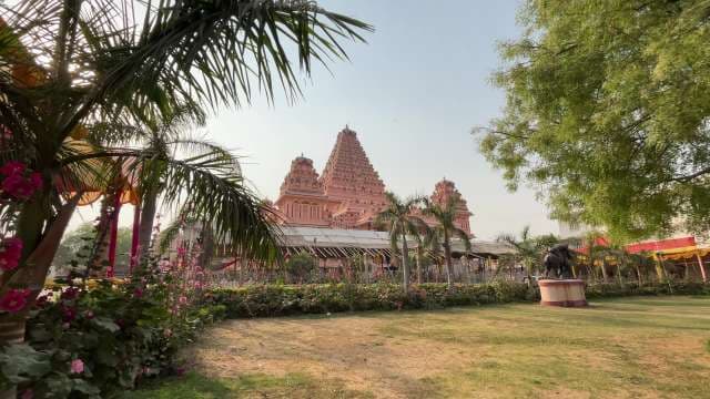 Majestic Hindu Temple Surrounded by Gardens and Palms