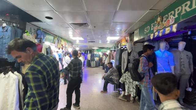 Bustling Indoor Clothing Market Shopping Experience
