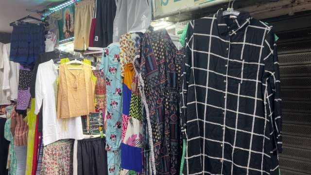 Vibrant Street Market Display Of Trendy Apparel Choices