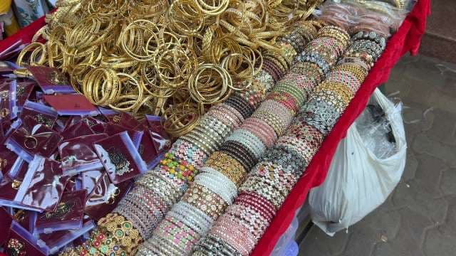 Colorful Indian Bangles and Bracelets Displayed at Market Stall