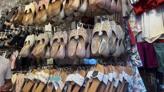 Traditional Ladies Footwear Displayed at Local Market Stall