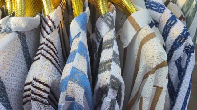 Colorful Patterned Shirts on Display in Fashion Market