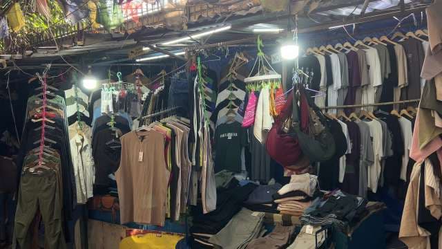 Trendy Street Market Clothing Stall With Colorful Apparel
