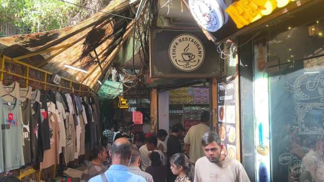 Bustling Day at Tenpa Restaurant Cafe in Delhi Market