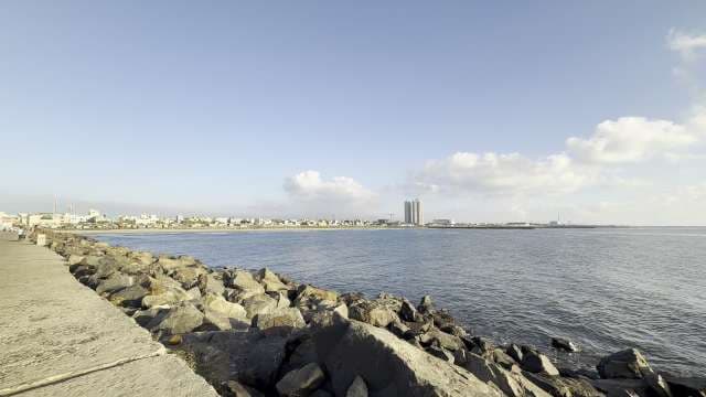 Stunning Coastal Cityscape View From the Rocky Shore