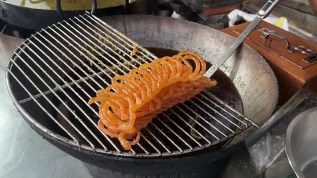Crispy Jalebi Being Freshly Fried on Street Stall
