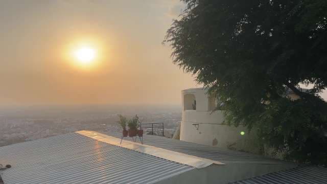 Beautiful Hilltop Sunset Over City Rooftops