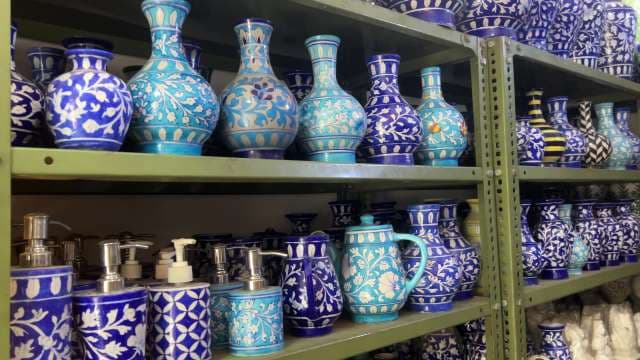 Traditional Jaipur Blue Pottery Displayed on Shelves