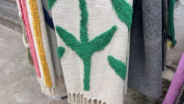 Handmade Textiles Featuring Colorful Woven Patterns and Designs